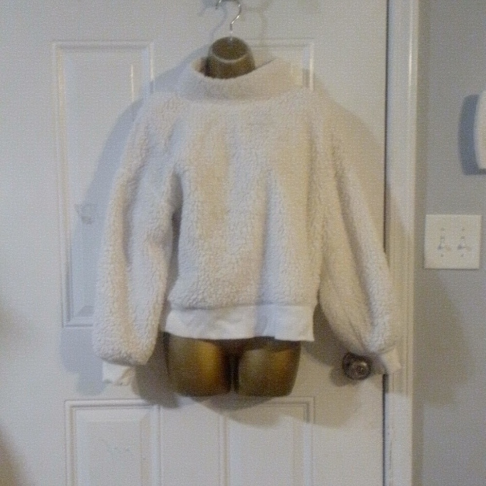 A white fluffy sweater